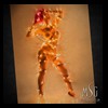 nude-model-photographed-with-painterly-effect-while-being-wrapped-in-christmas-tree-lights-photography-and-art-copyrighted-by-my-sensual-gift-of-houston-texas